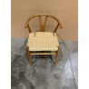 SECONDE MAIN - Chaise en bois de mahogany, dossier arrondi et assise en rotin