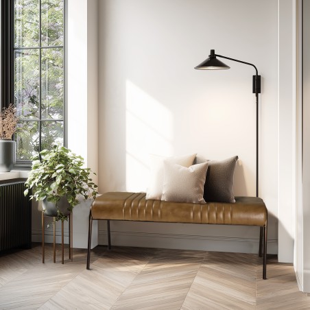 Banc matelassé en cuir marron et pieds acier