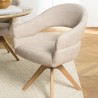 Swivel chair in beige fabric with rounded backrest, wooden legs | Ugo Collection