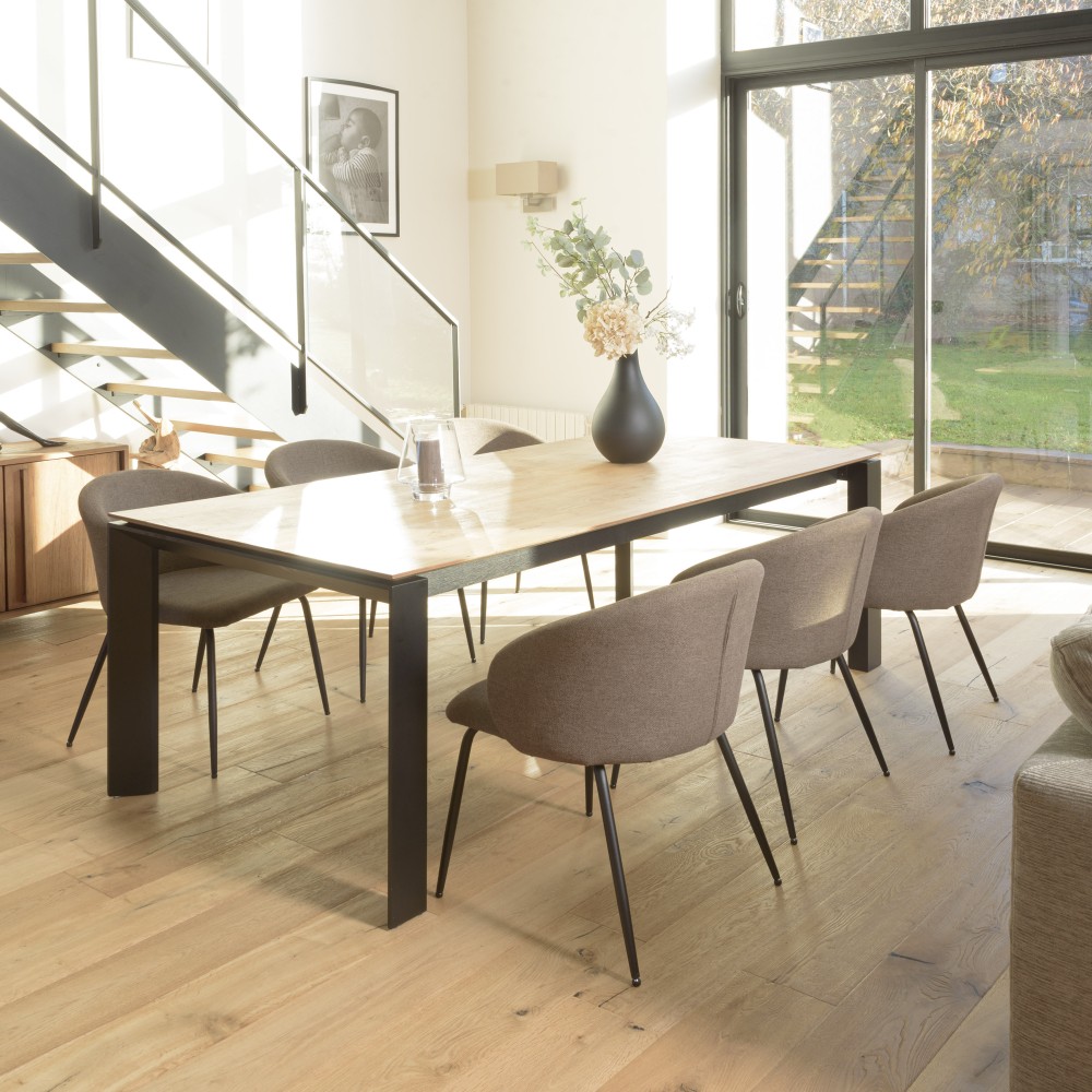 Second-hand - Brown fabric chair with rounded backrest and black steel legs