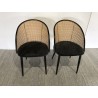 SECOND-HAND - 2 black fabric armchairs with rounded backs and cane effect
